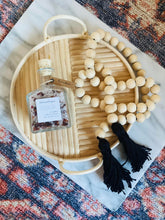 Load image into Gallery viewer, Natural Mango Wood Contentment Bead with black tassels
