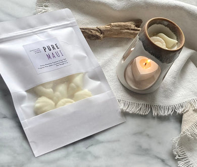 Sea shell shaped wax melts from the Coastal Collection in a resealable package. Pure Maui scent shown. 