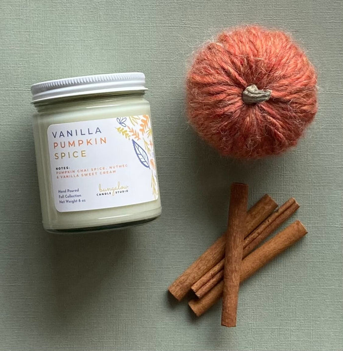 The Vanilla Pumpkin Spice Candle Scent from Bungalow's Fall Collection is shown in the 8 oz glass jar with a white lid.
