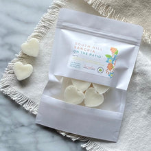 Load image into Gallery viewer, Heart-shaped Soy Wax Melts from the Bungalow Spring and Summer Collection in a white sealed package with a window in the South Hill Sangria on the Patio scent.
