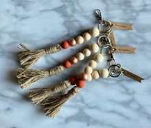 Load image into Gallery viewer, Mango Wood Bead Keychain with Jute Tassel  |  Colors of Autumn
